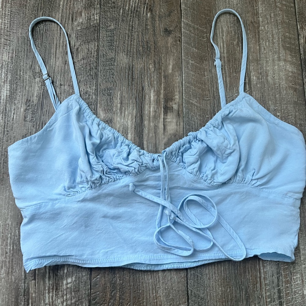 Baby blue tank top with adjustable straps. kendal and kylie brand size small